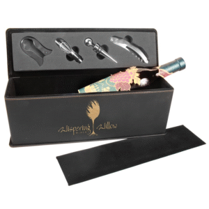 Wine box with tools and a bottle of wine. Logo is gold on black leatherette.